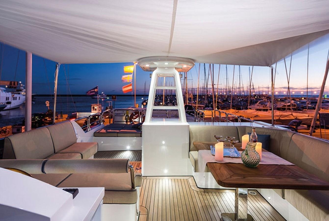 a room with a large window aboard UNICA Yacht for Sale