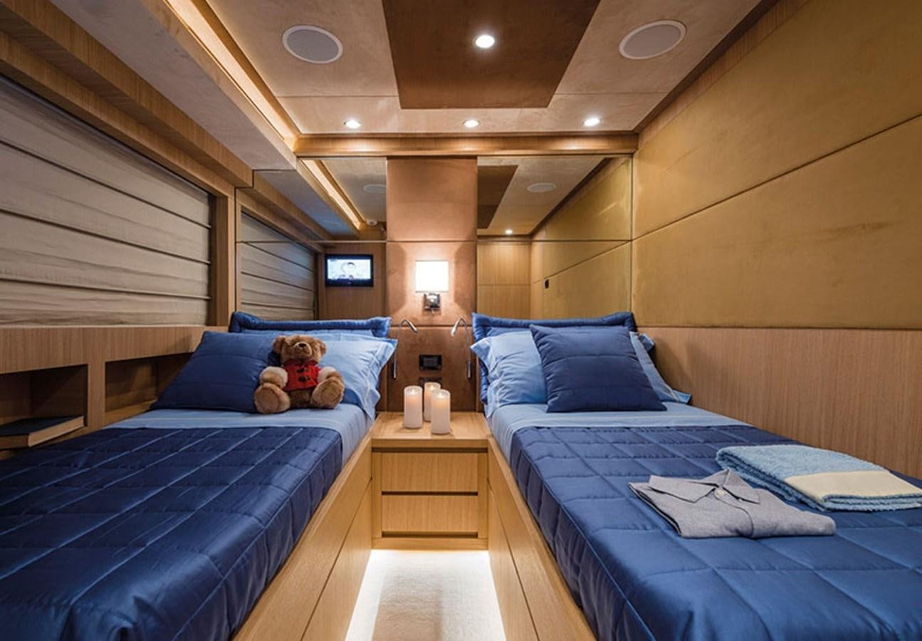 a room with two beds aboard UNICA Yacht for Sale