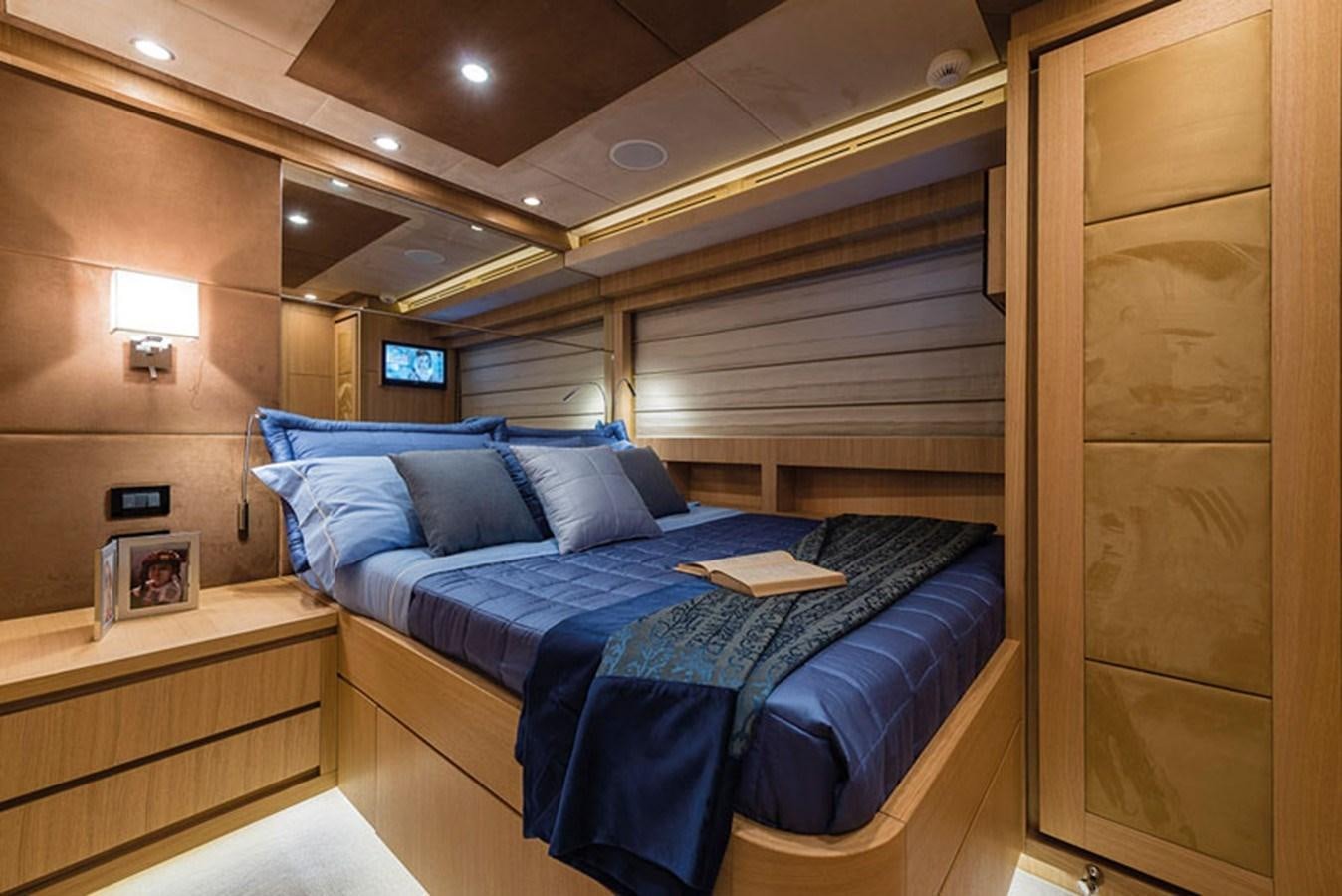 a bed in a room aboard UNICA Yacht for Sale