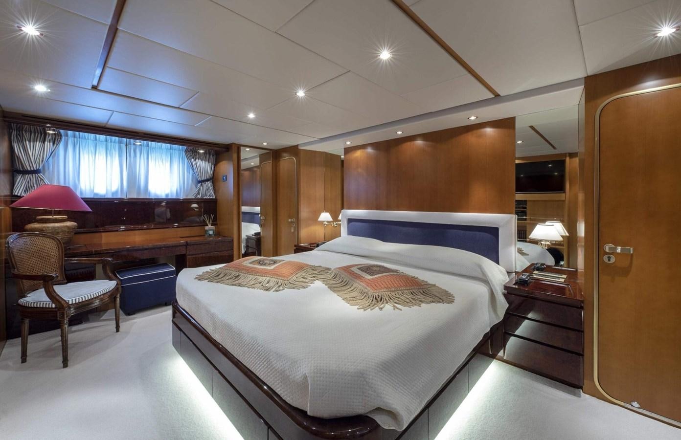 a large bedroom with a large bed aboard CODECASA DUE FALCO 24 Yacht for Sale