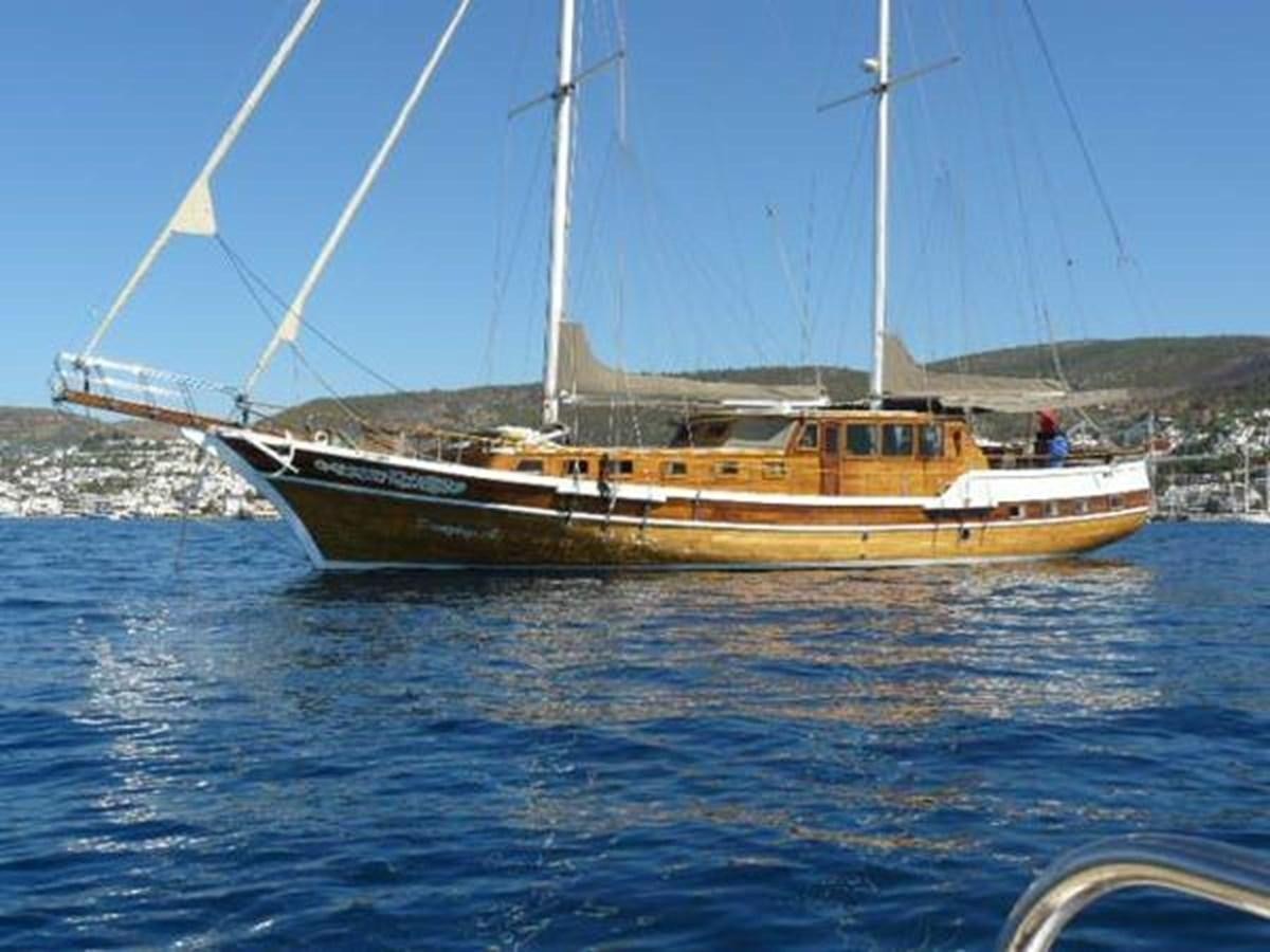 a boat on the water aboard 1998 CUSTOM SAILING YACHT Yacht for Sale