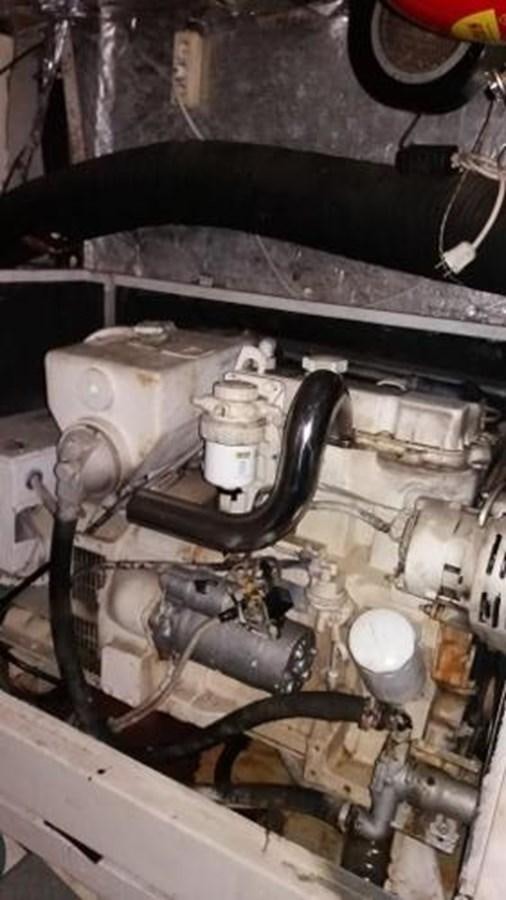 a close-up of a car engine aboard 1998 CUSTOM SAILING YACHT Yacht for Sale