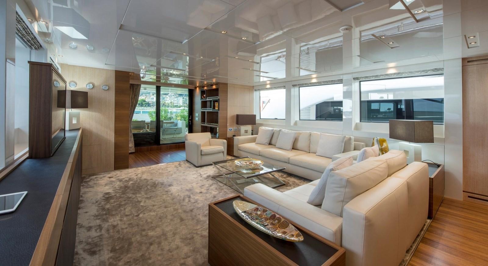 a living room with a large window aboard 2015 SANLORENZO SL96 #623 Yacht for Sale