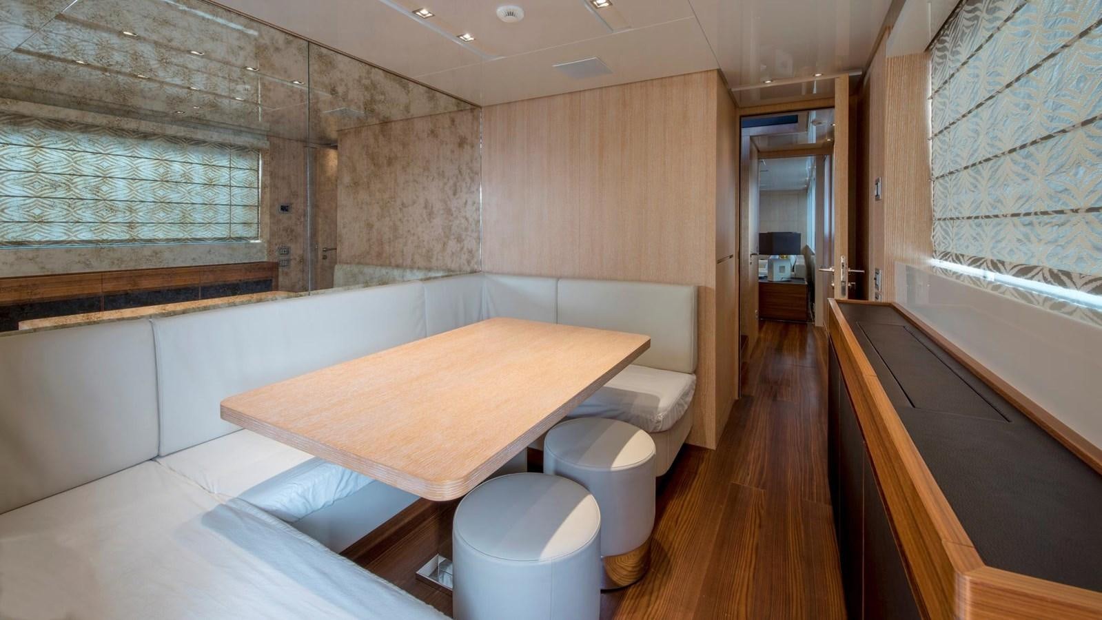 a room with a table and chairs aboard 2015 SANLORENZO SL96 #623 Yacht for Sale
