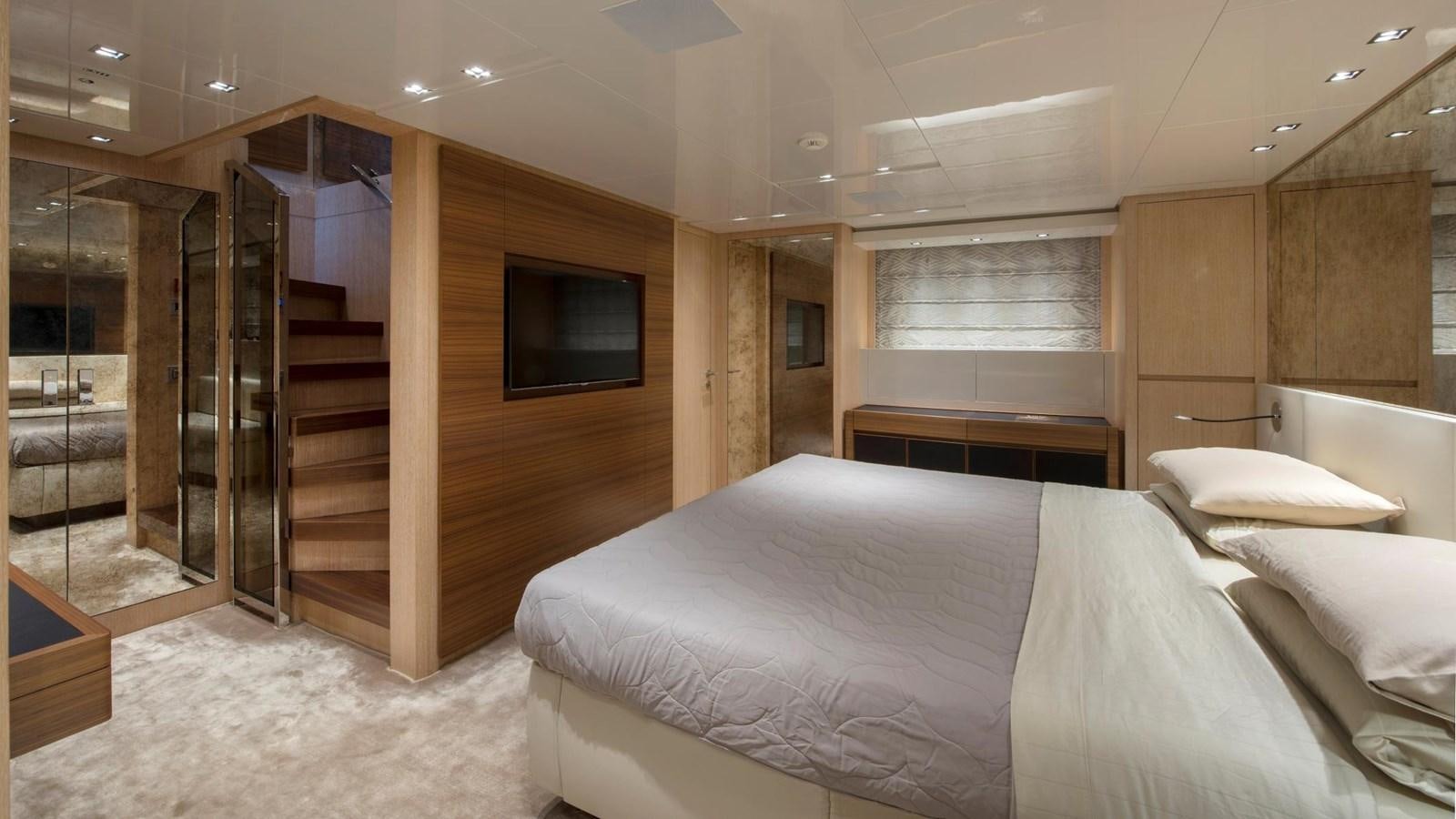 a room with a bed and a tv aboard 2015 SANLORENZO SL96 #623 Yacht for Sale