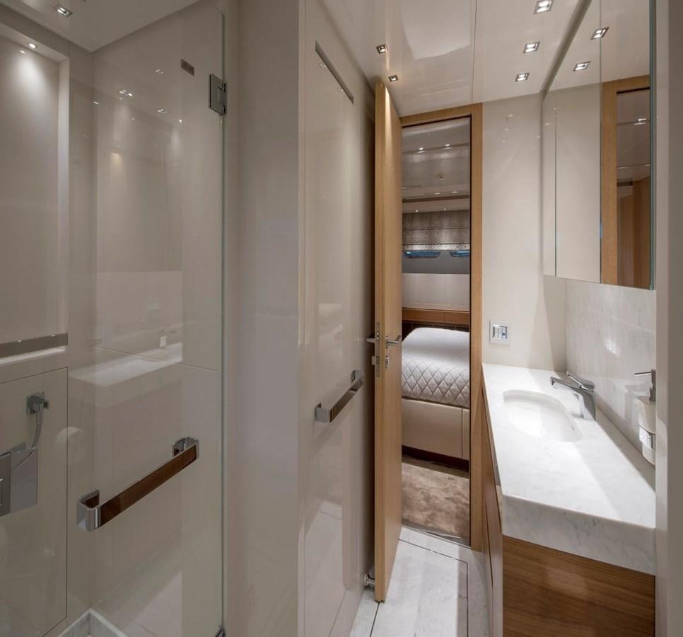 a bathroom with a glass shower aboard 2015 SANLORENZO SL96 #623 Yacht for Sale