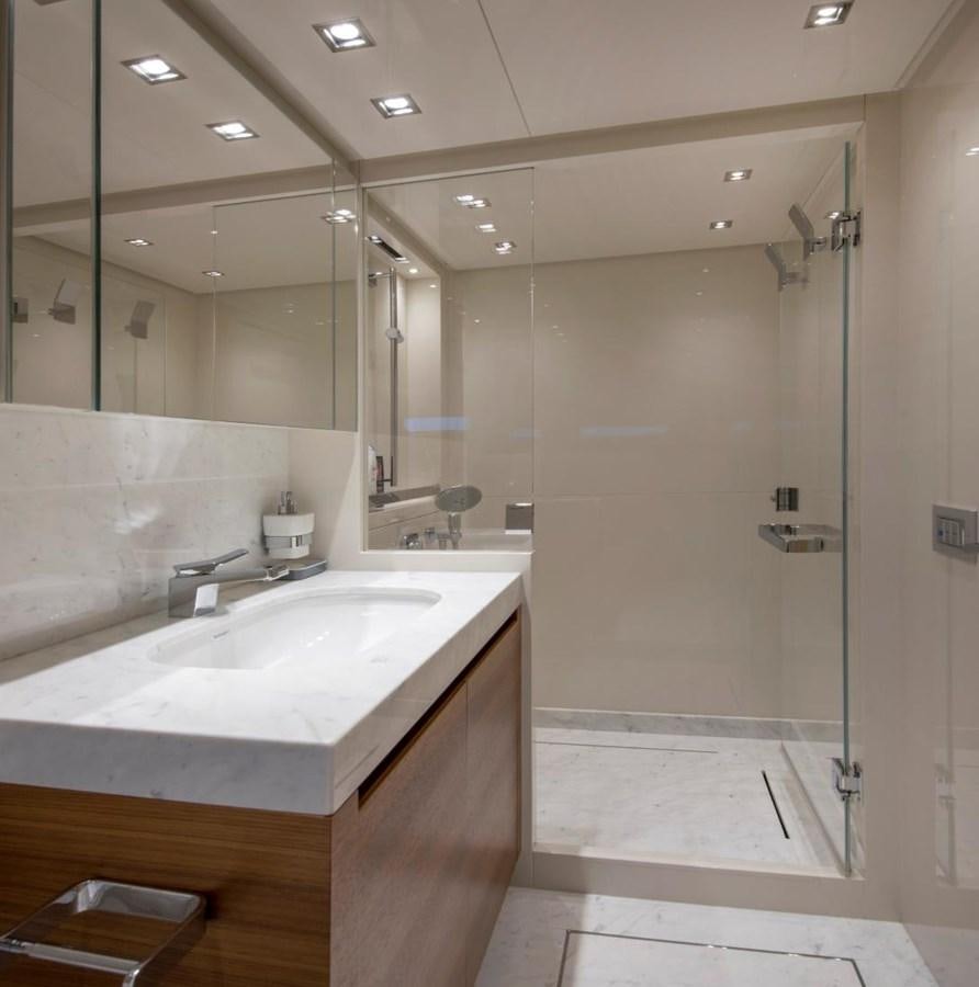 a bathroom with a shower and sink aboard 2015 SANLORENZO SL96 #623 Yacht for Sale