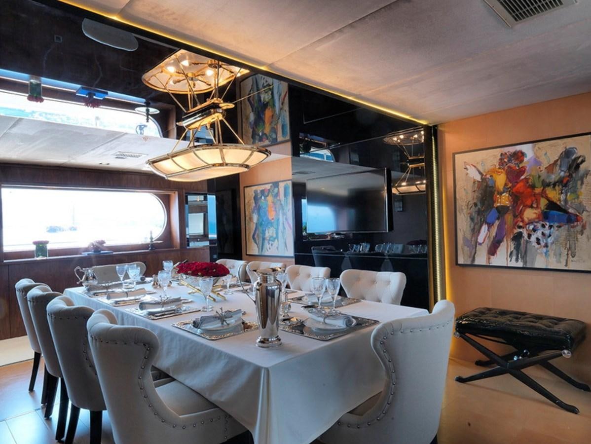 a dining room with tables and chairs aboard QUEEN MARE Yacht for Charter