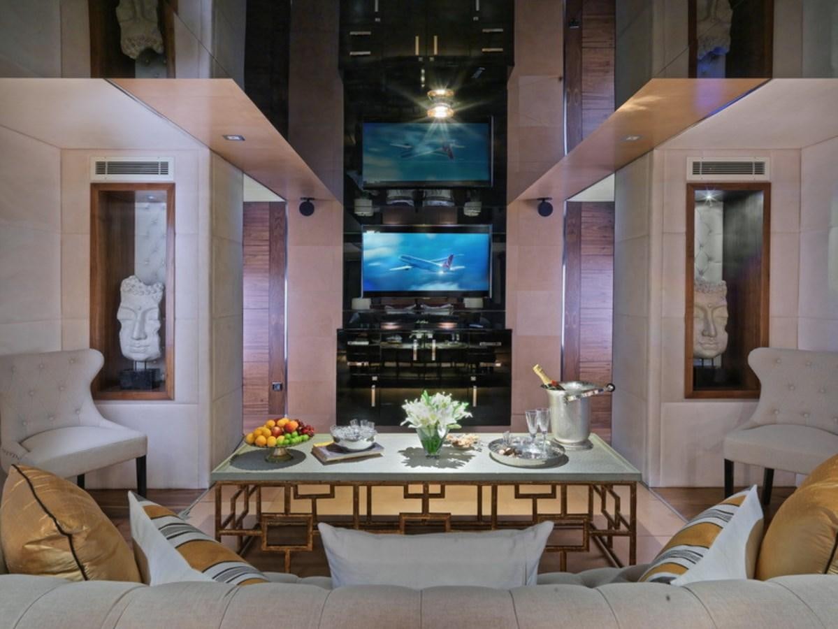 a room with a table and chairs aboard QUEEN MARE Yacht for Charter