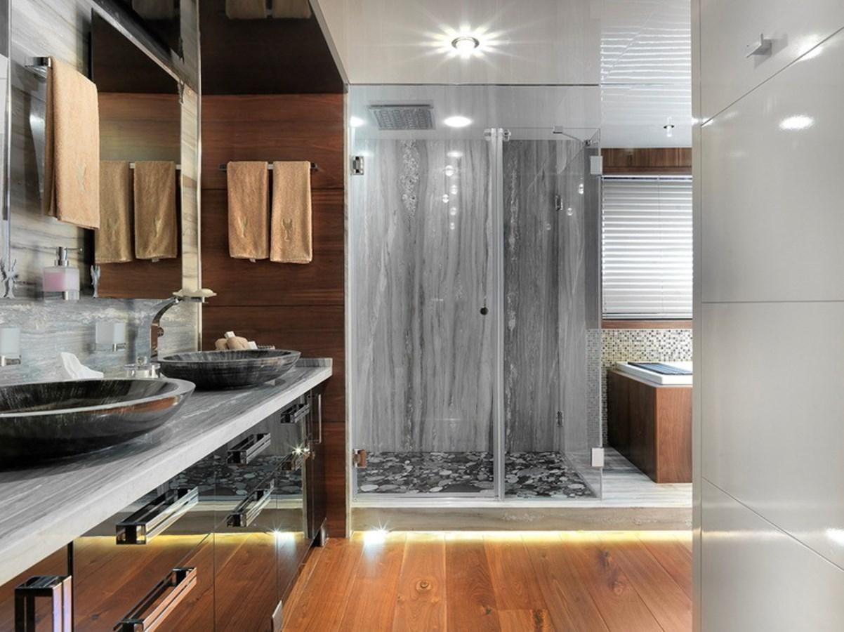 a bathroom with a shower and sink aboard QUEEN MARE Yacht for Charter