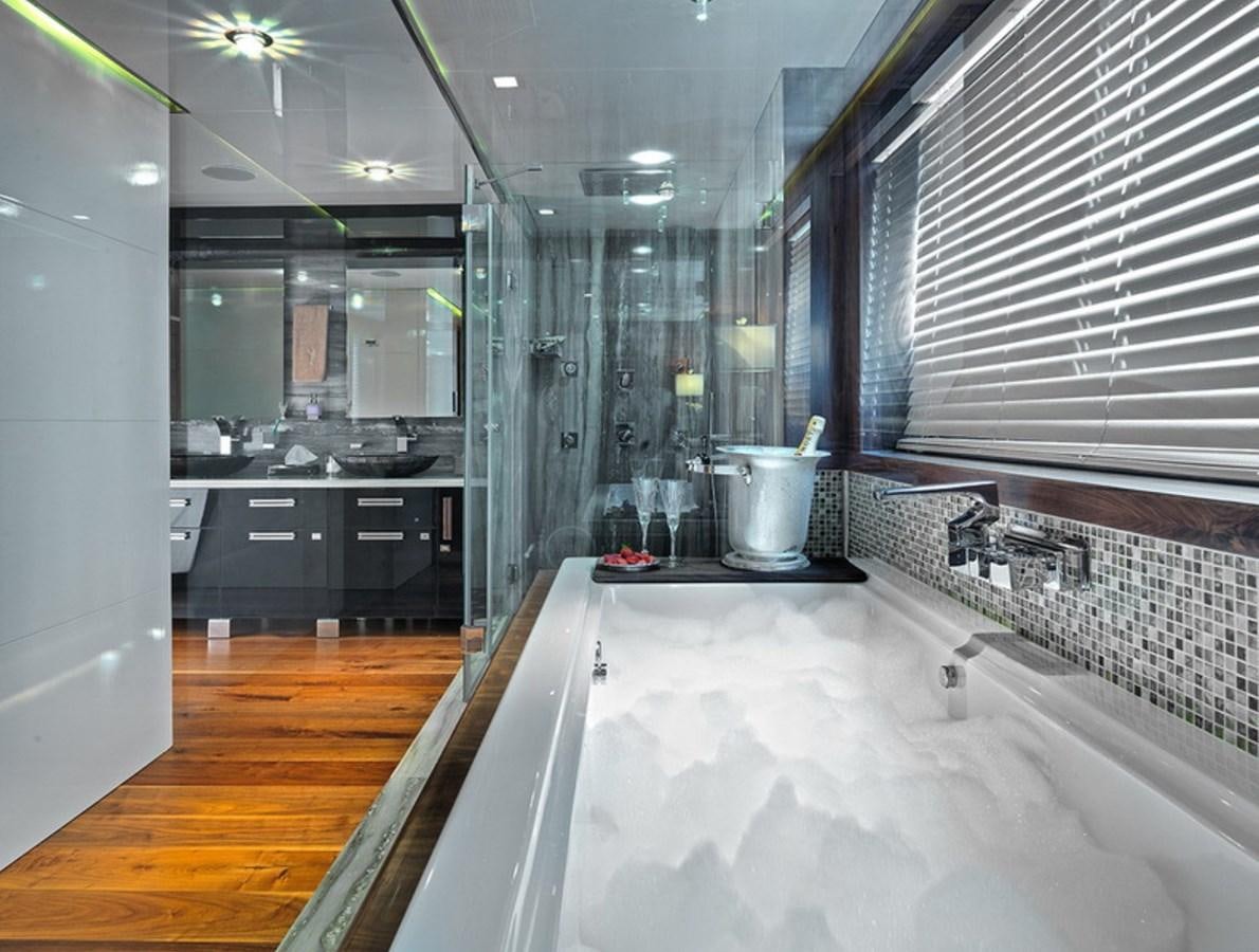 a large bathroom with a large marble countertop aboard QUEEN MARE Yacht for Charter