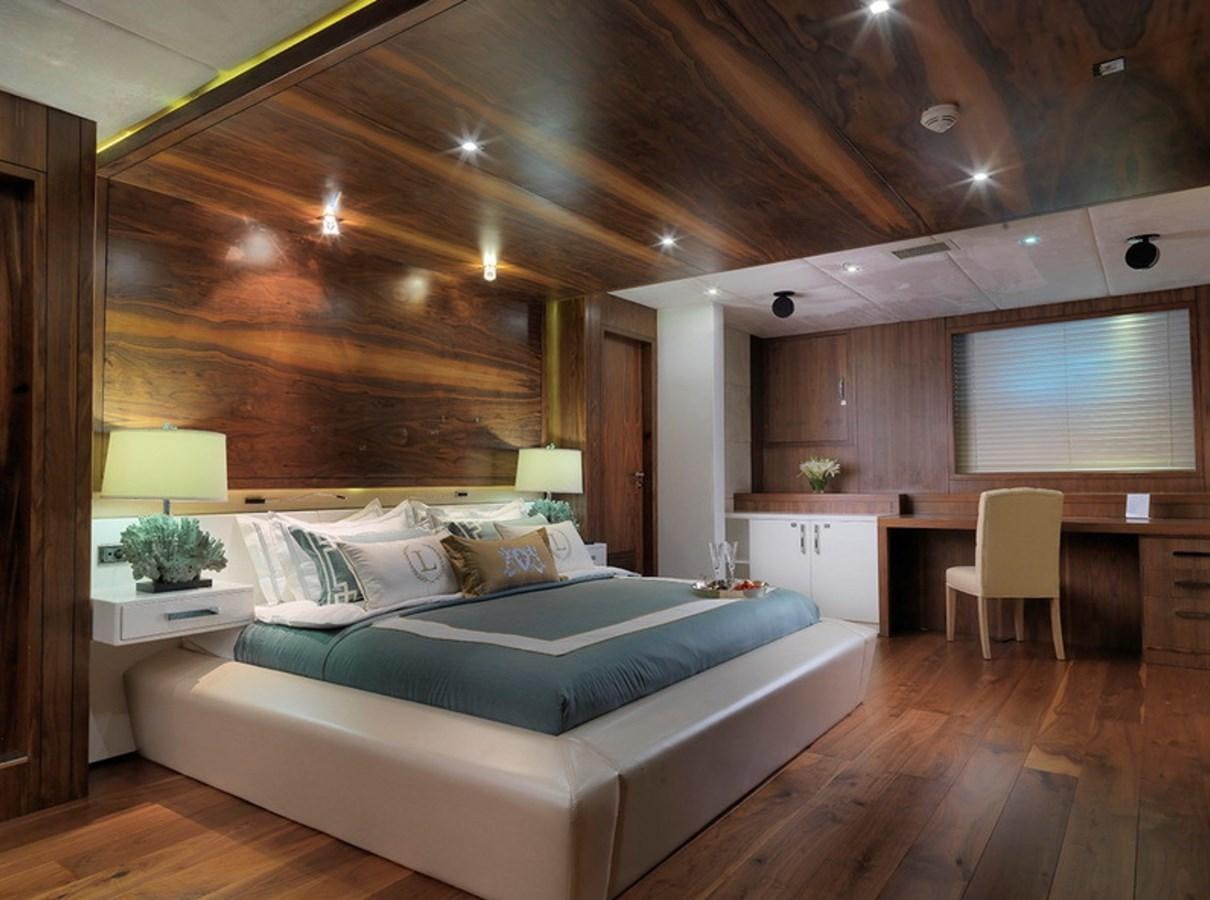a large bedroom with a large bed aboard QUEEN MARE Yacht for Charter