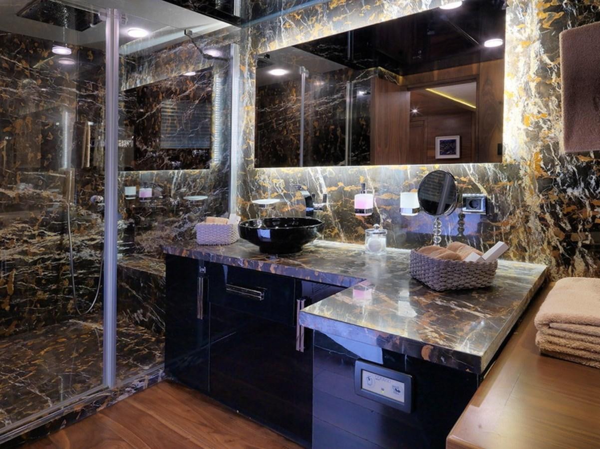 a kitchen with a sink and countertop aboard QUEEN MARE Yacht for Charter