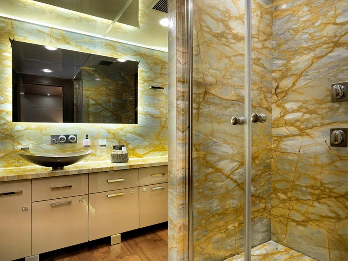 a bathroom with a glass shower aboard QUEEN MARE Yacht for Charter