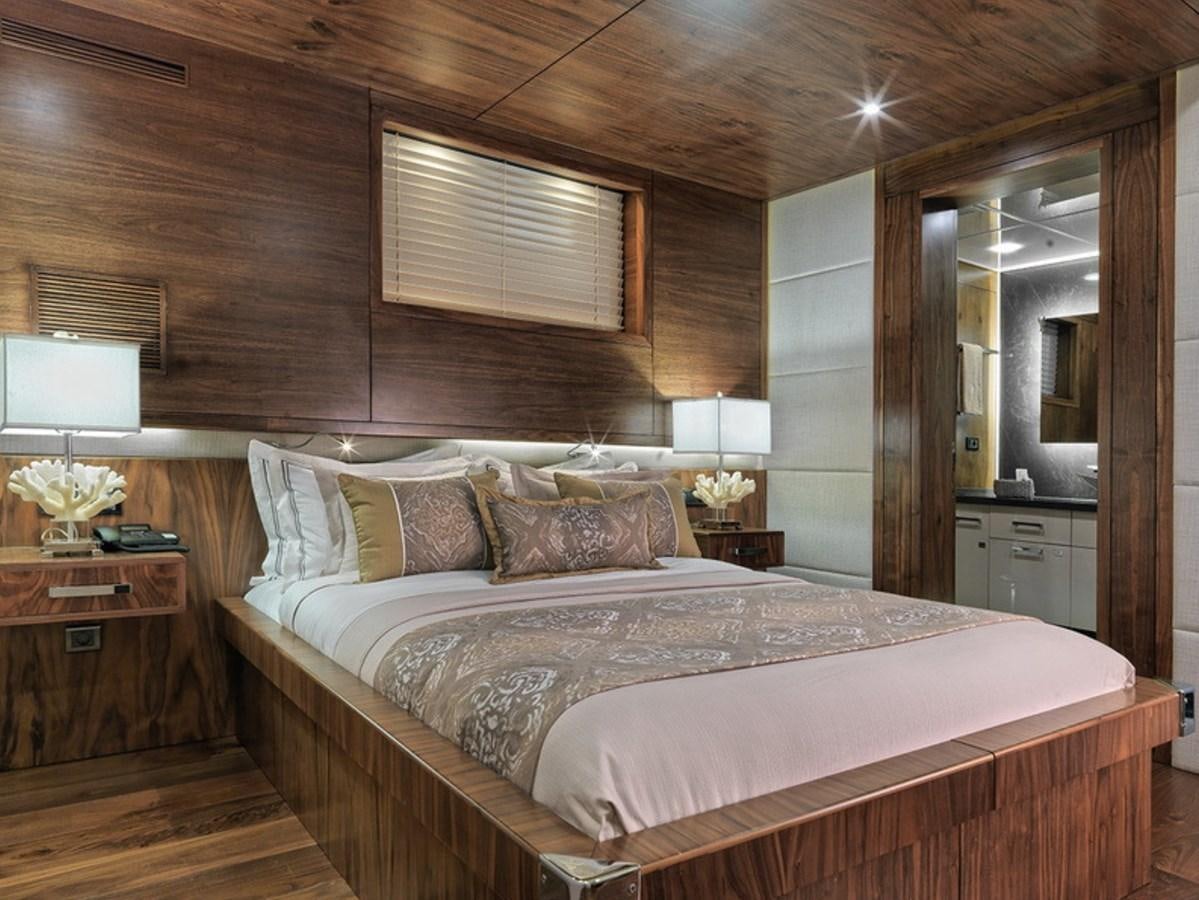 a large bed in a room aboard QUEEN MARE Yacht for Charter