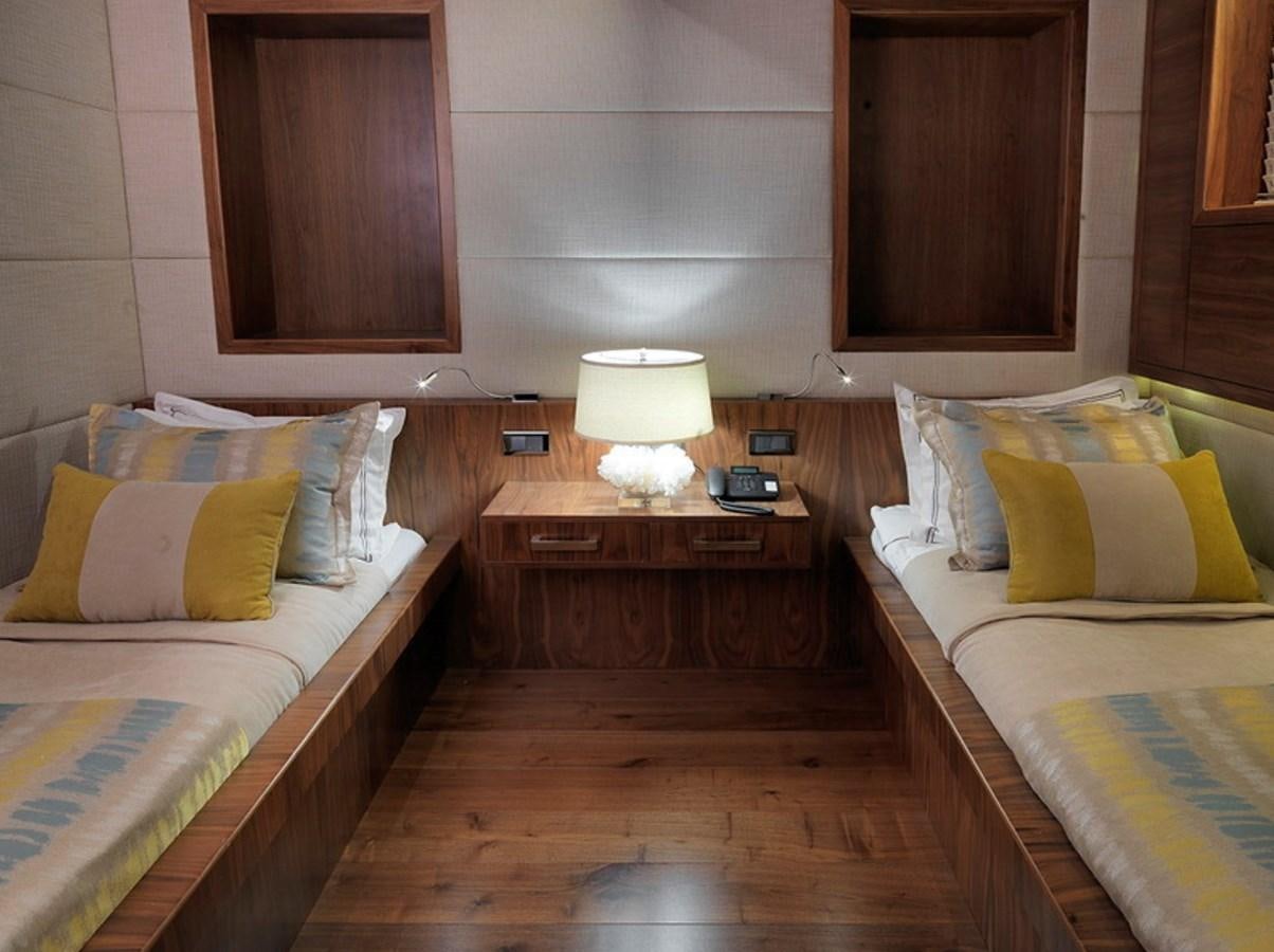 a couple of beds in a room aboard QUEEN MARE Yacht for Charter