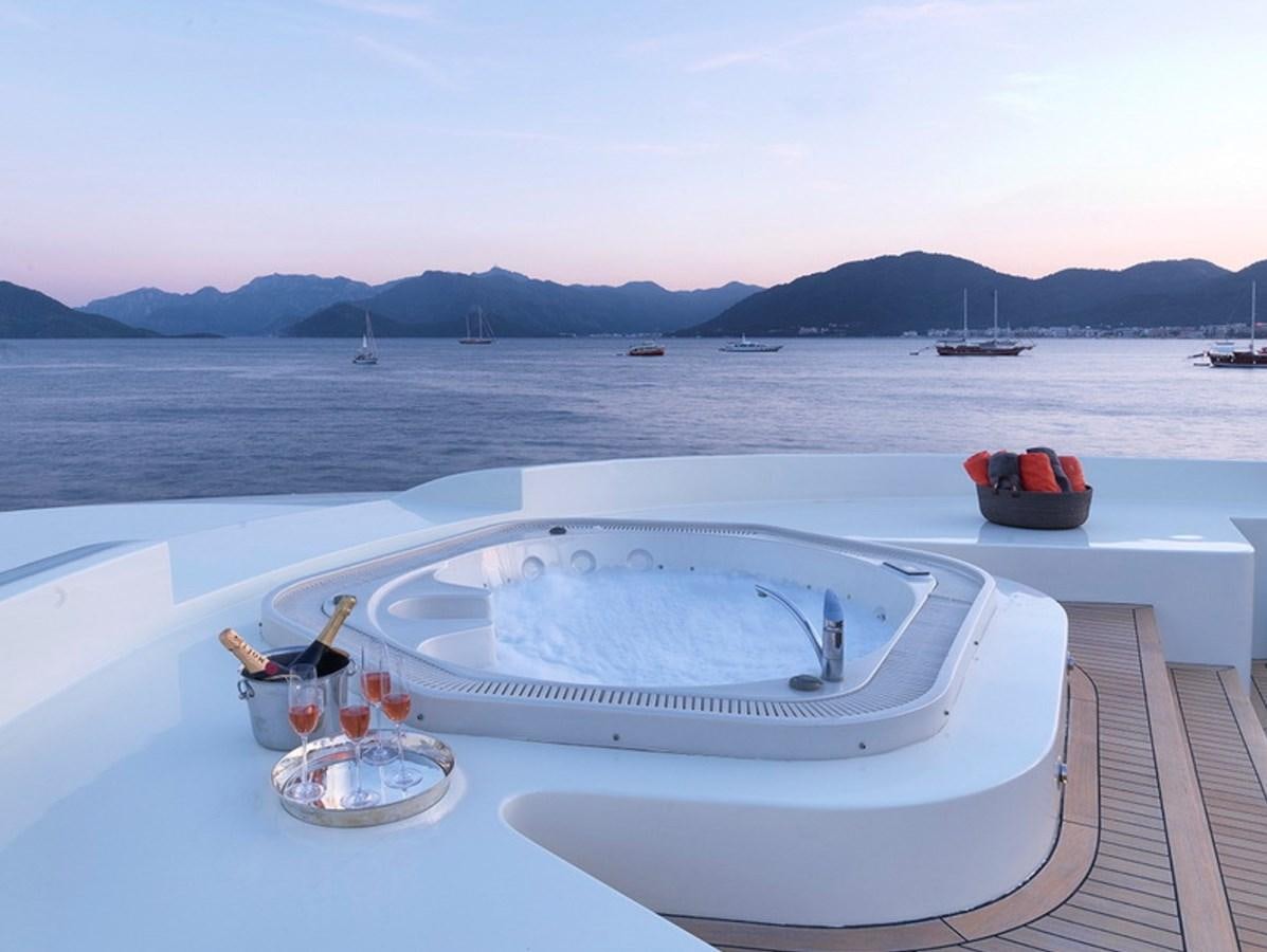 a boat on a deck aboard QUEEN MARE Yacht for Charter