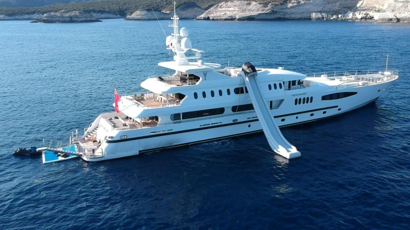 a white yacht in the water aboard QUEEN MARE Yacht for Sale