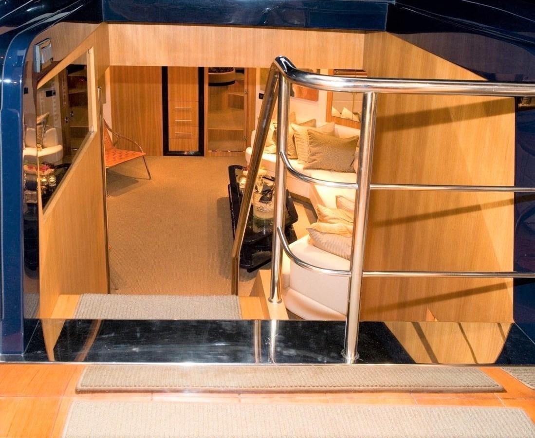 a large kitchen with a large stainless steel refrigerator aboard BON VIVANT Yacht for Sale