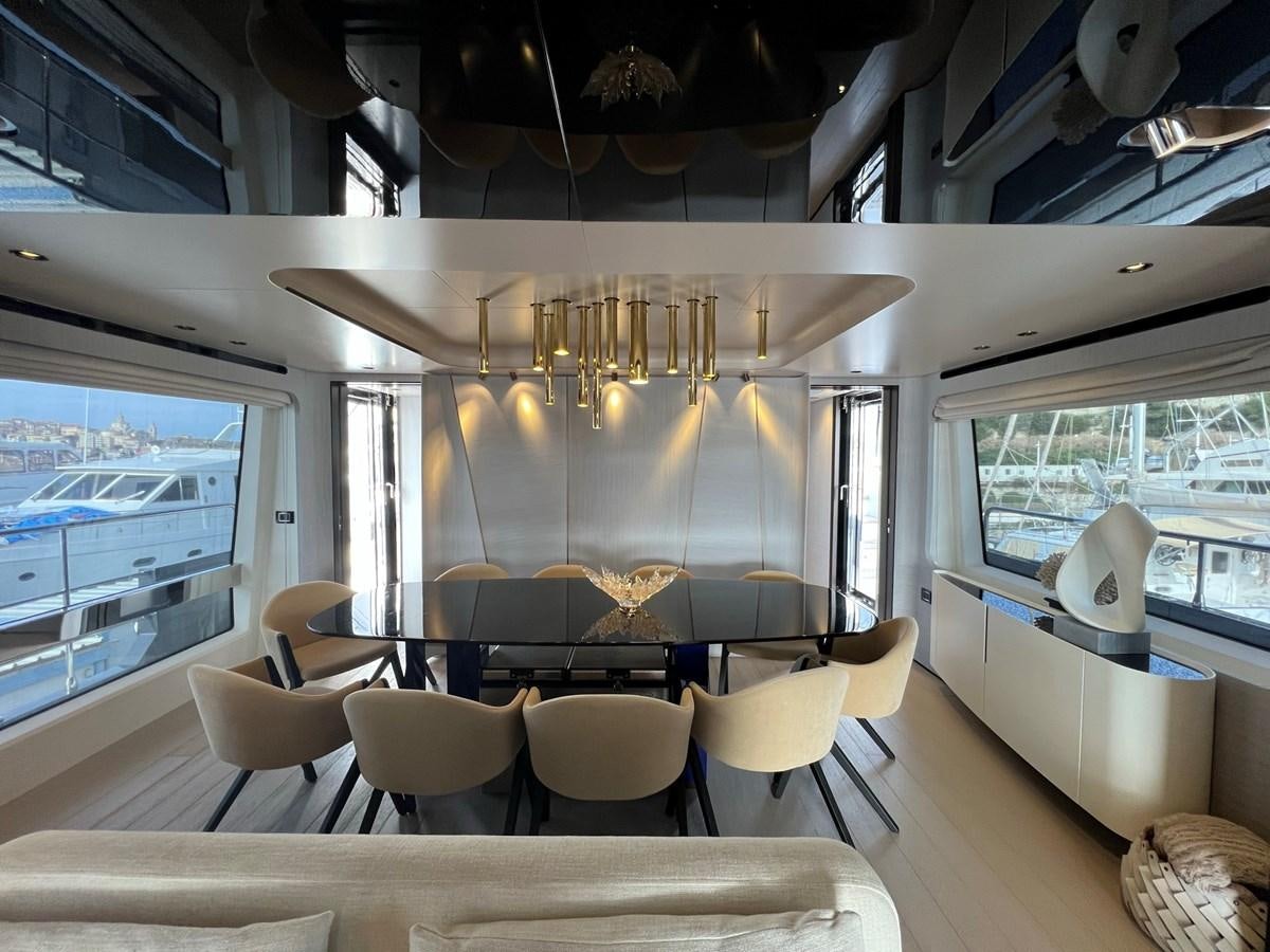 a room with a large window aboard QUEEN ANA Yacht for Sale