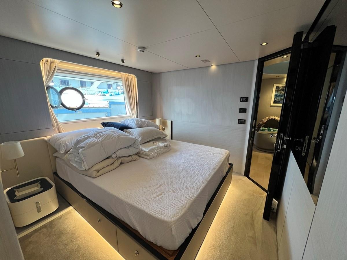 a hotel room with a bed aboard QUEEN ANA Yacht for Sale