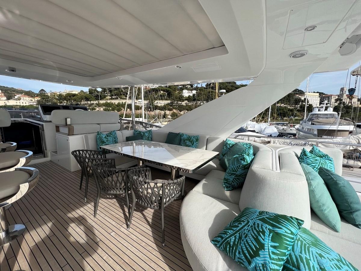 a large white tent with a table and chairs on a deck aboard QUEEN ANA Yacht for Sale