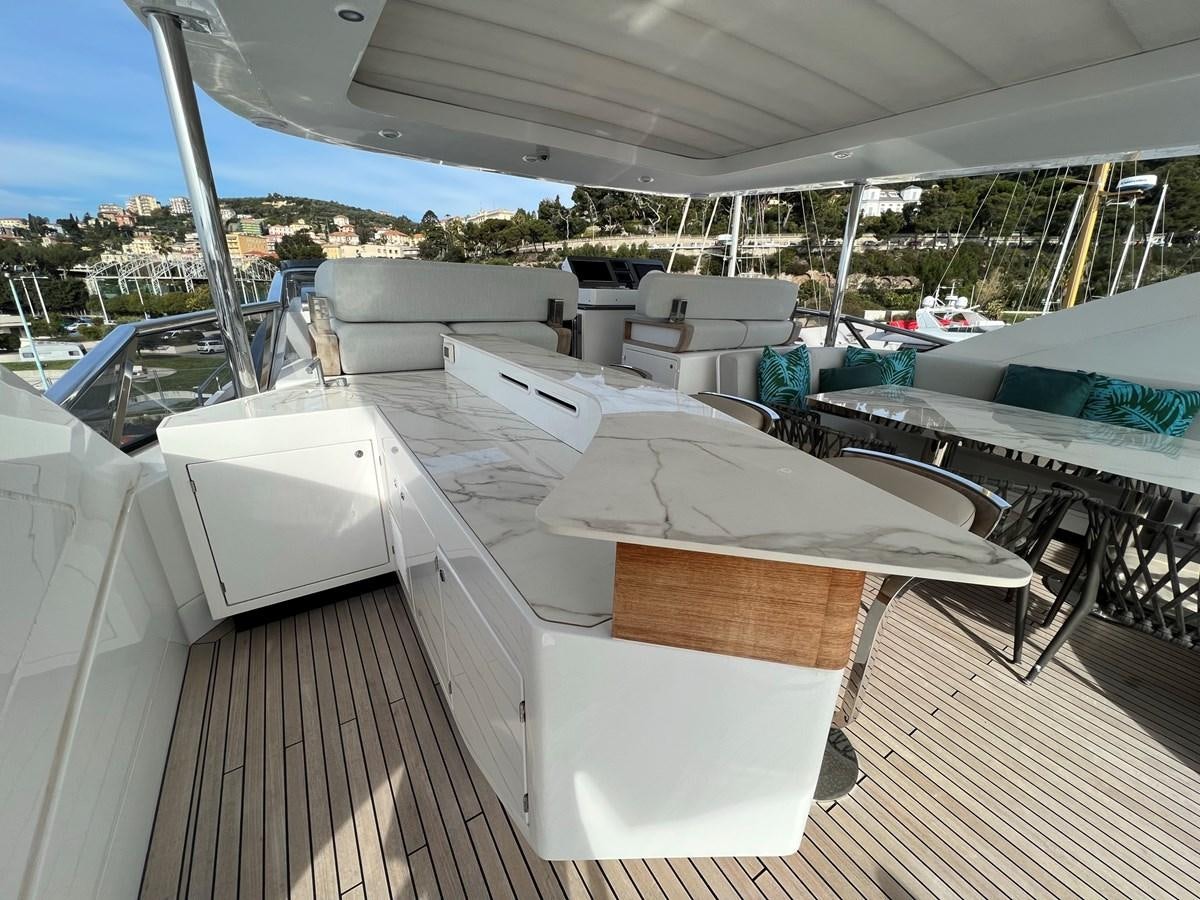 a boat on a deck aboard QUEEN ANA Yacht for Sale