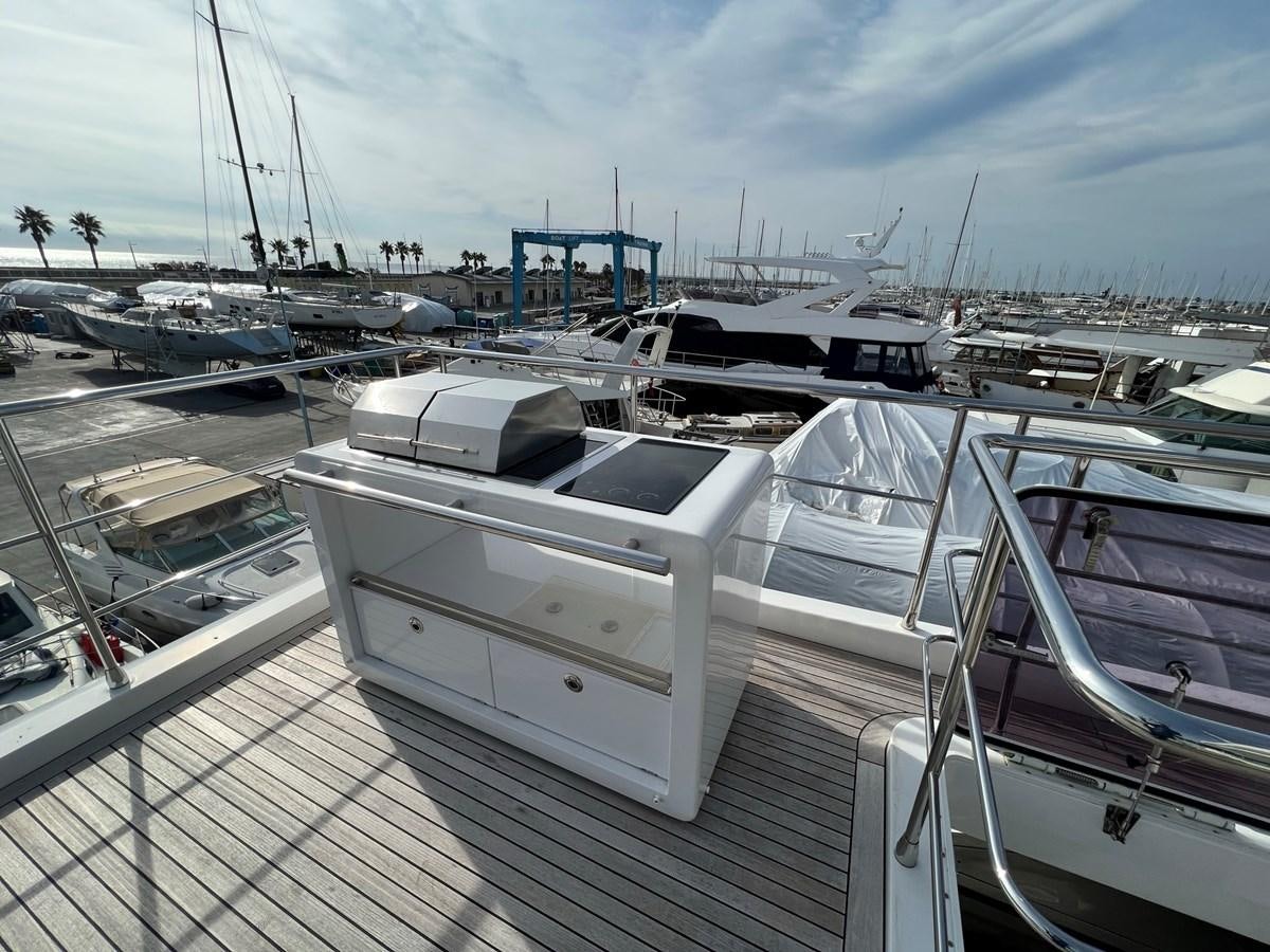 a boat docked at a pier aboard QUEEN ANA Yacht for Sale