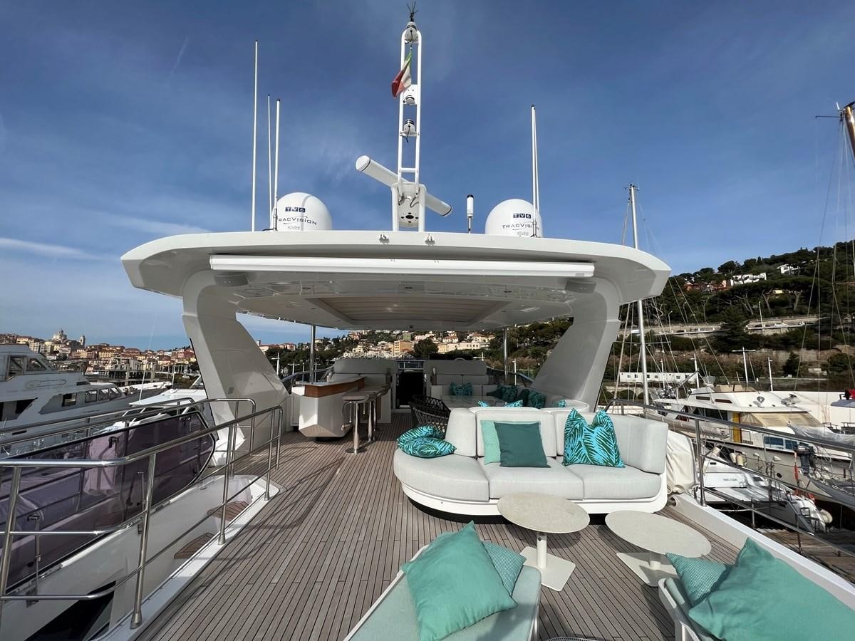 a large white ship docked aboard QUEEN ANA Yacht for Sale