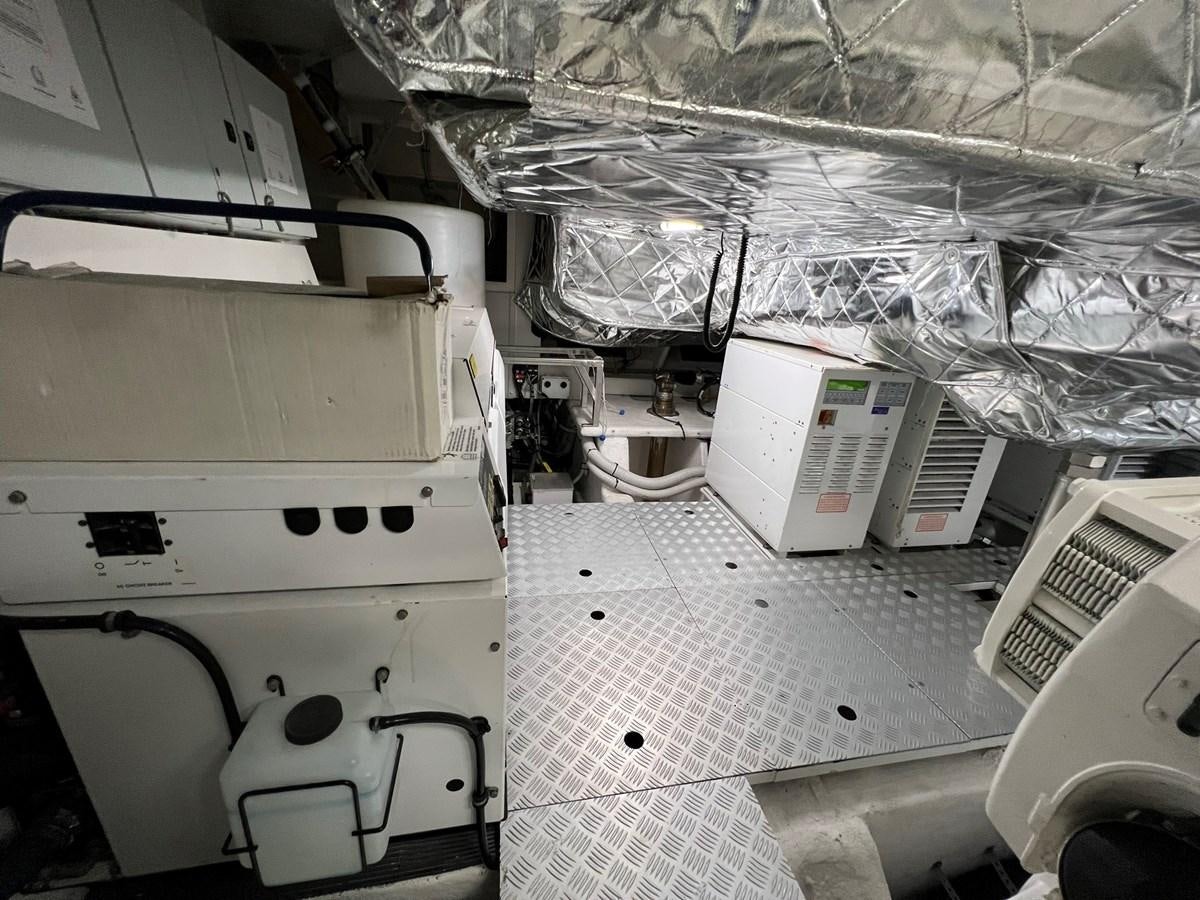 a room with a machine aboard QUEEN ANA Yacht for Sale