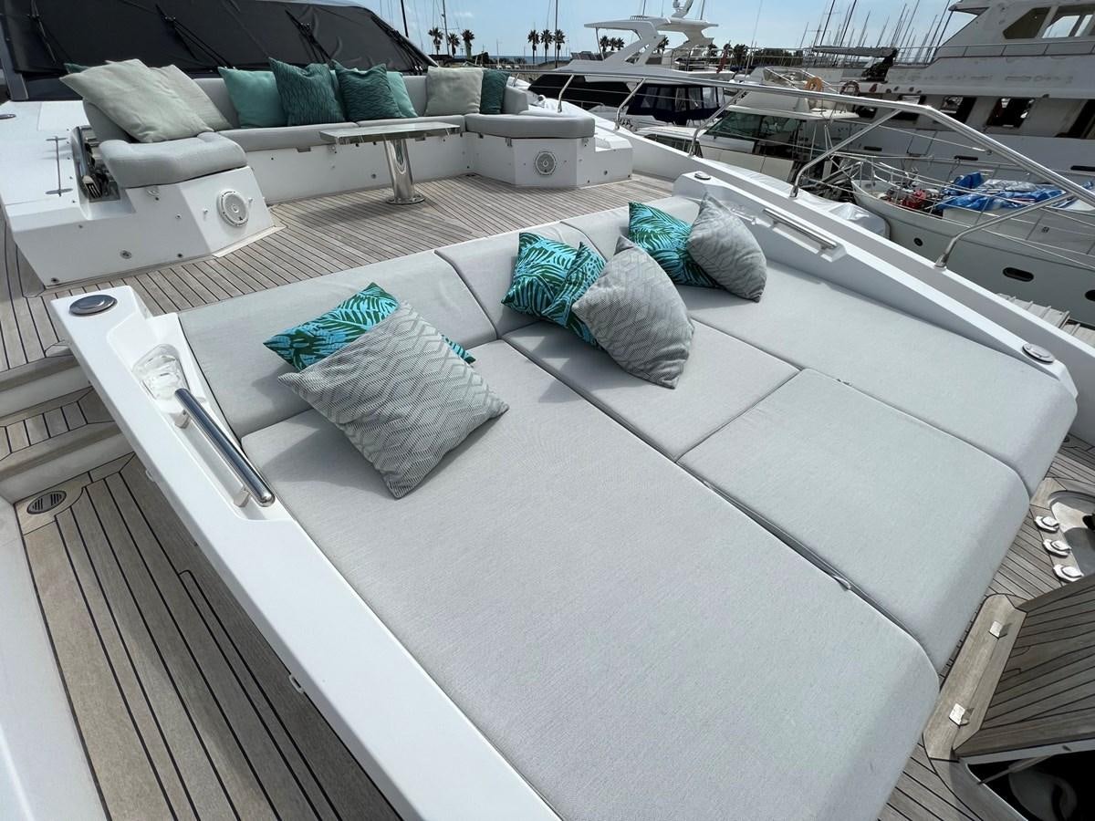 a rooftop with a couch and pillows aboard QUEEN ANA Yacht for Sale