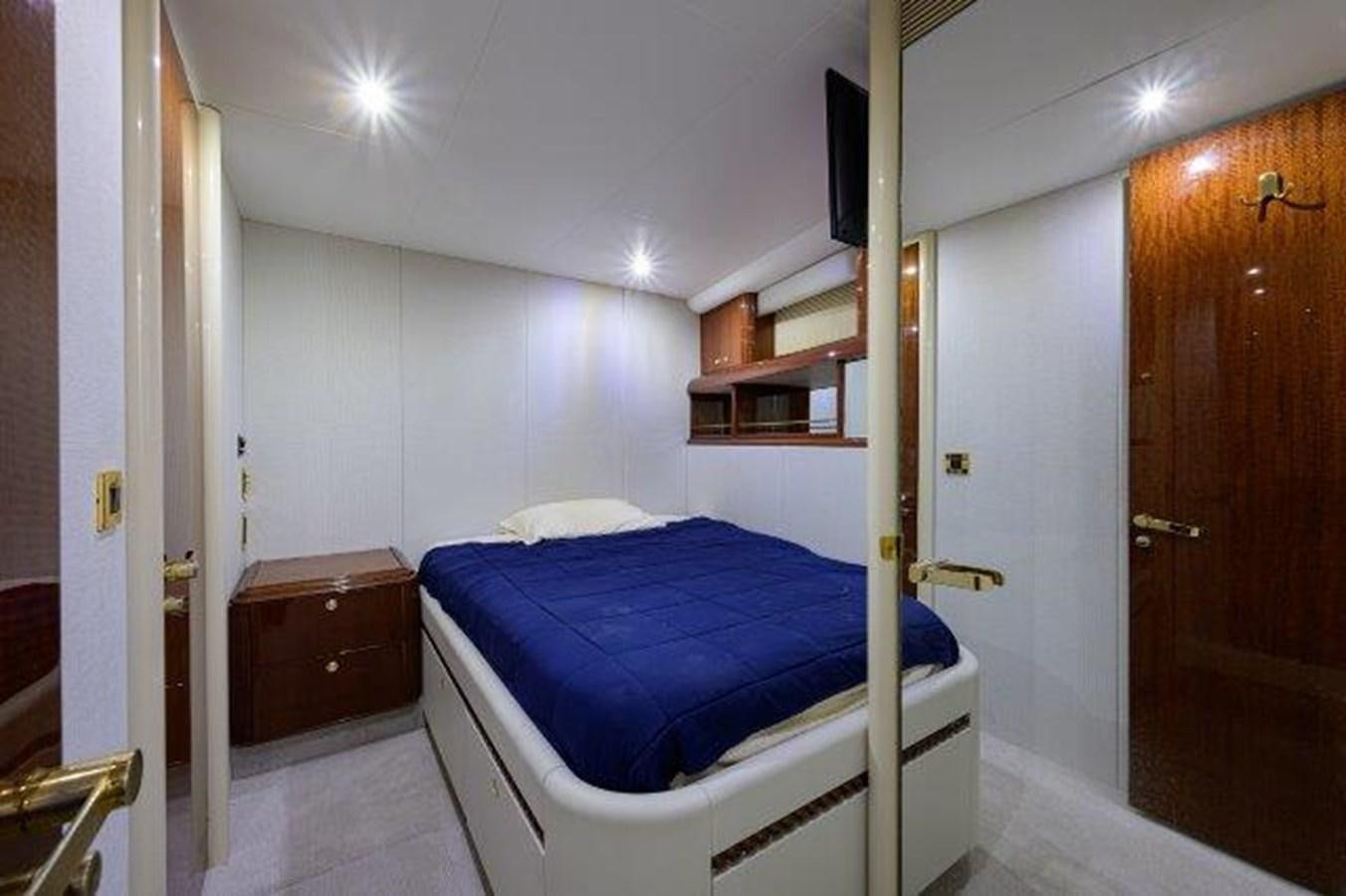 a bed in a room aboard SUZANNE Yacht for Sale