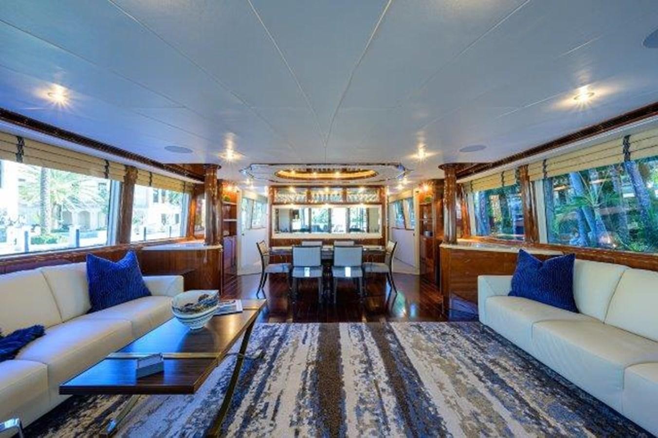 a living room with a large rug aboard SUZANNE Yacht for Sale