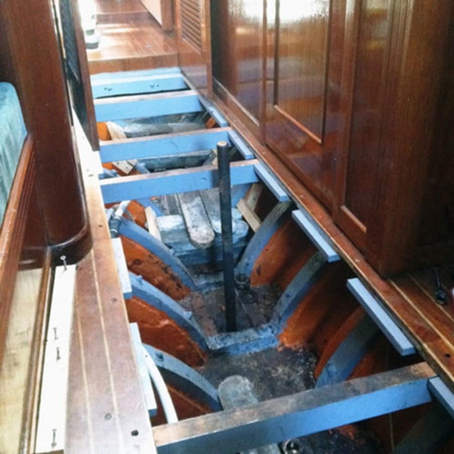 a group of wooden stairs aboard CURLEW Yacht for Sale