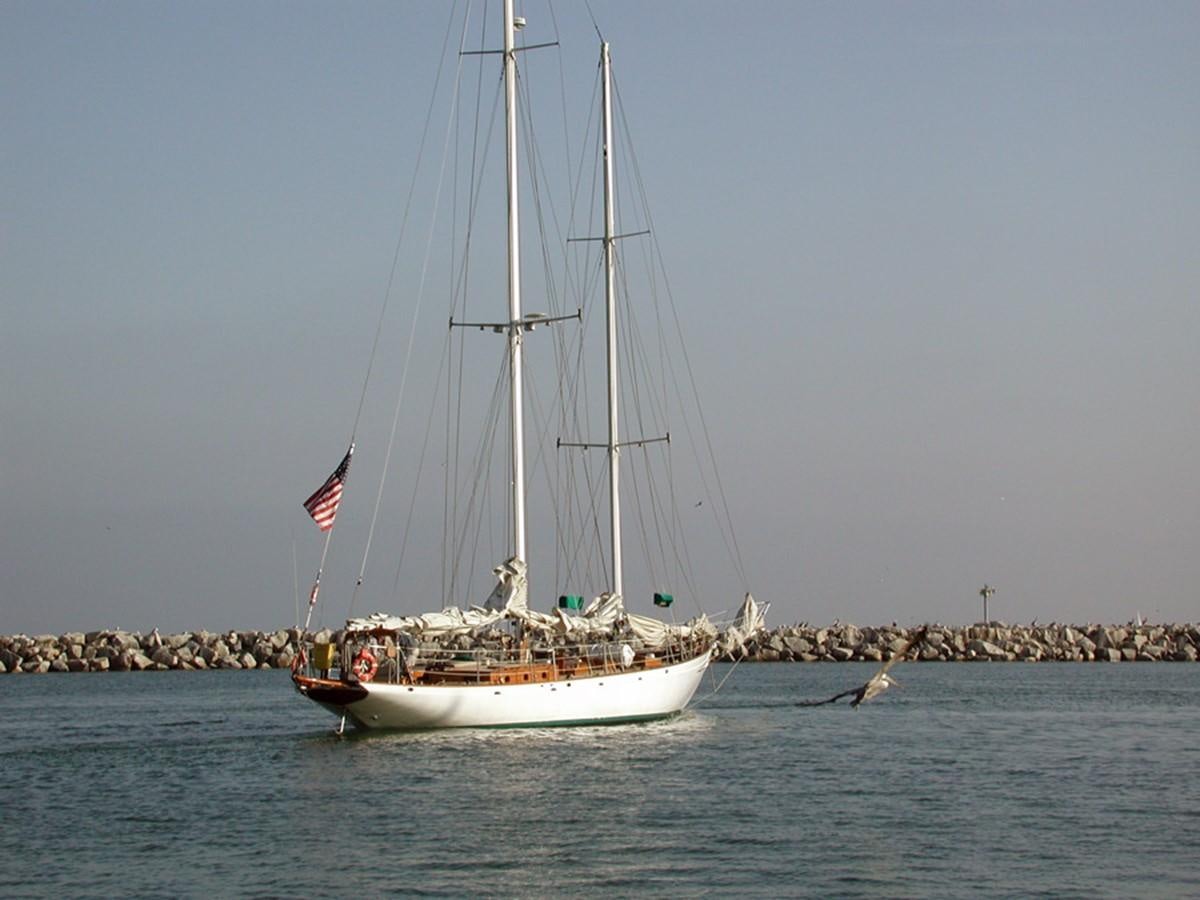 a sailboat on the water aboard CURLEW Yacht for Sale