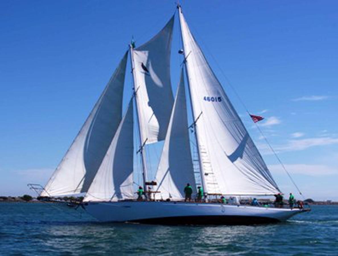 a sailboat on the water aboard CURLEW Yacht for Sale