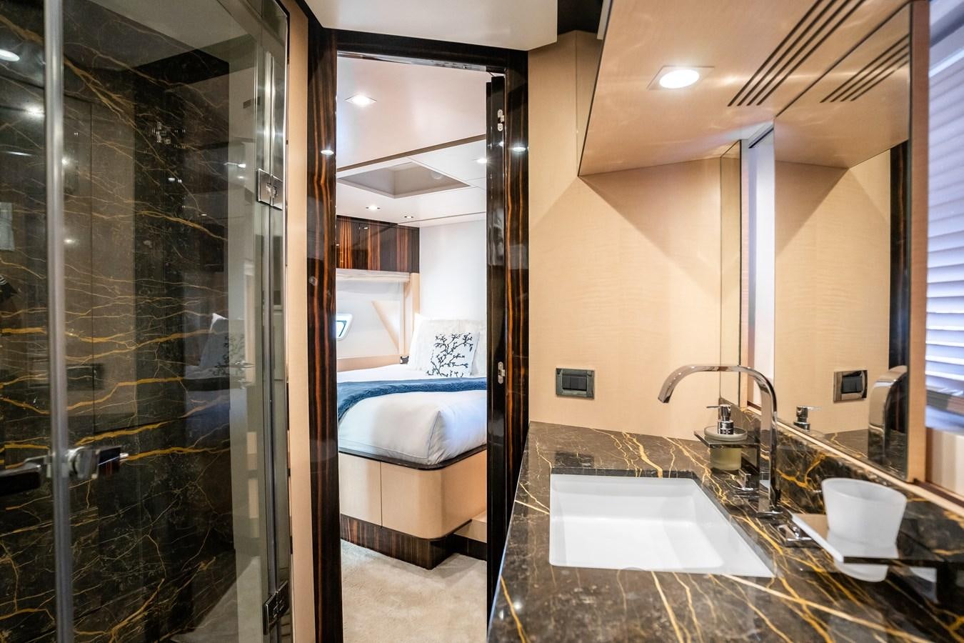 a bathroom with a large glass shower aboard Valere Yacht for Sale
