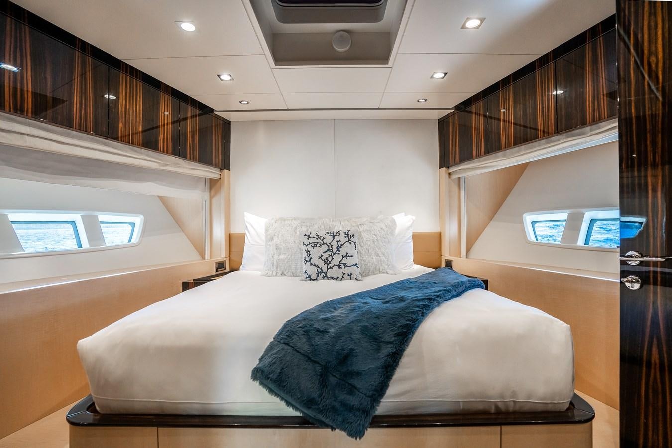 a bed in a room aboard Valere Yacht for Sale