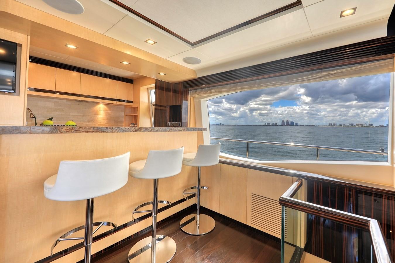 a room with chairs and tables aboard Valere Yacht for Sale