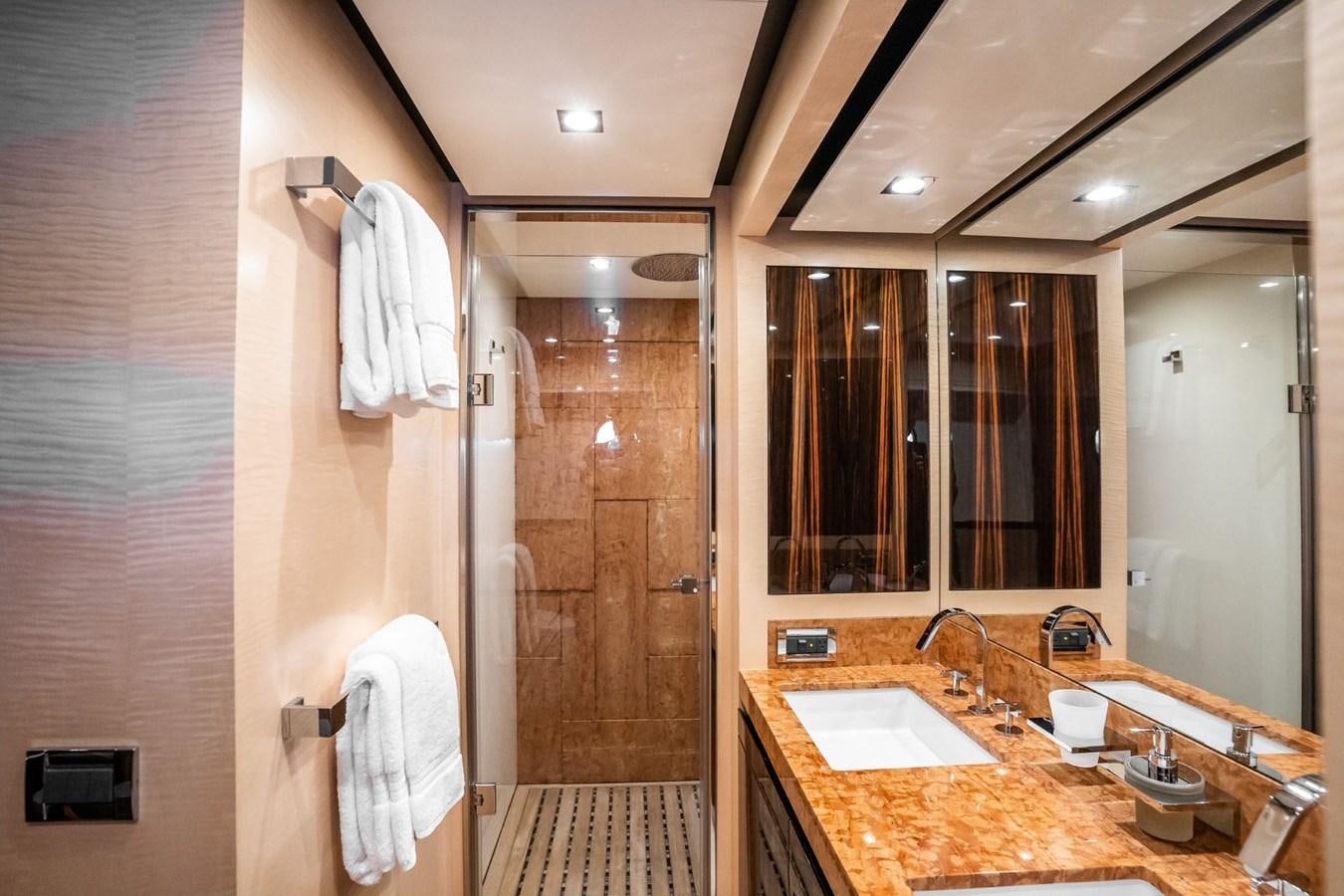 a bathroom with a sink and a shower aboard Valere Yacht for Sale