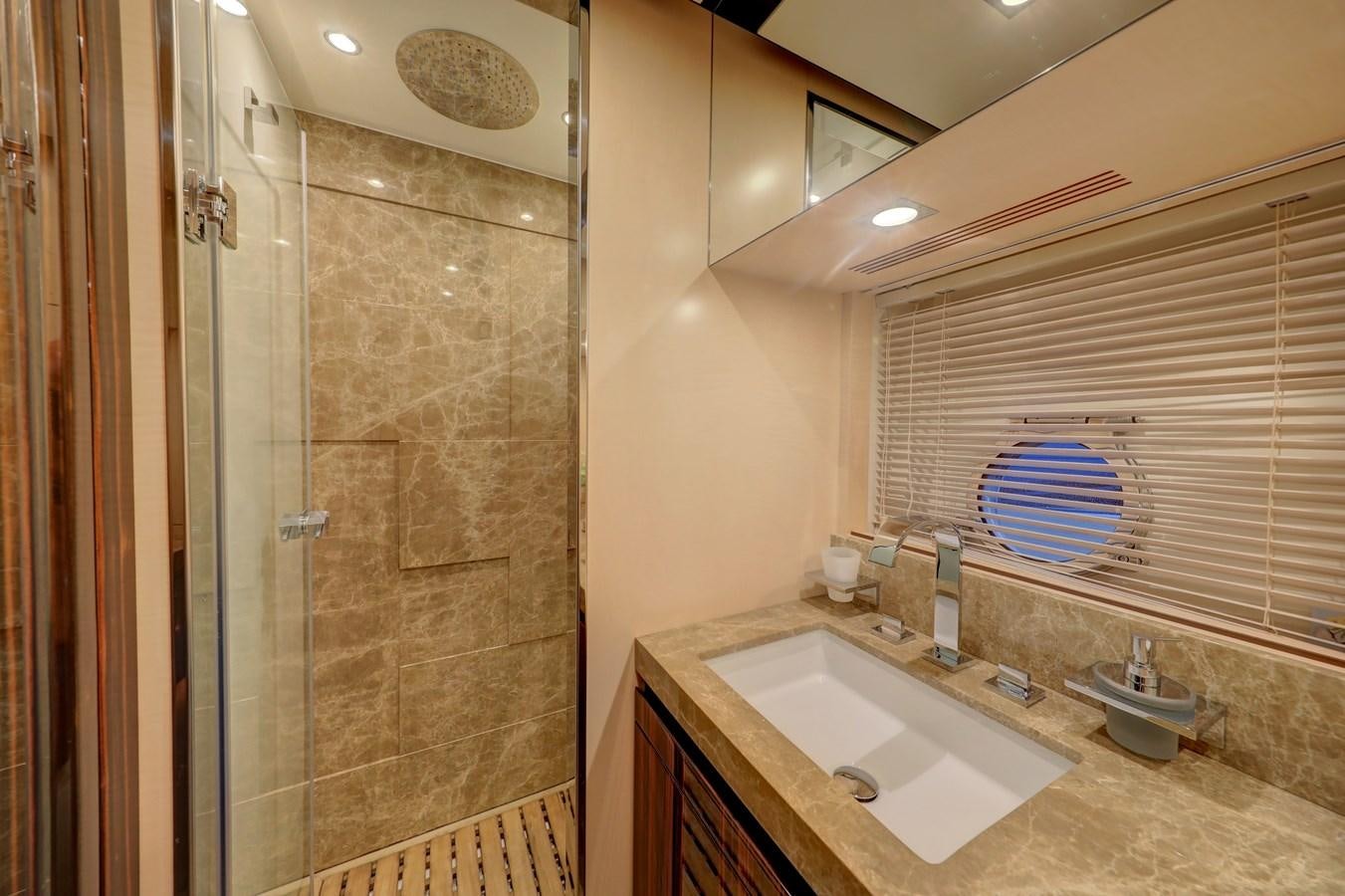 a bathroom with a sink and a shower aboard Valere Yacht for Sale