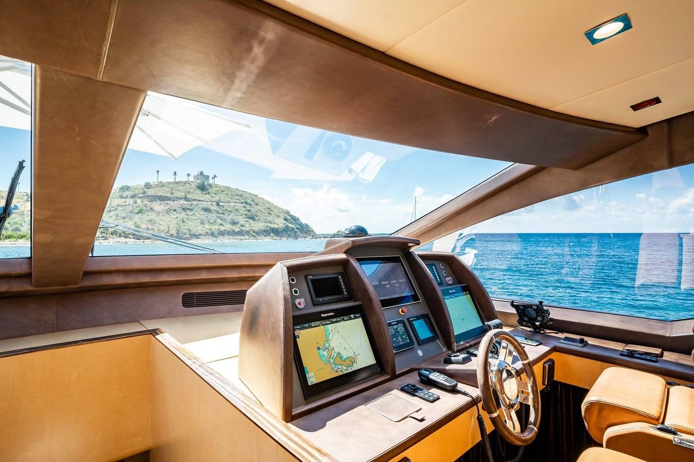inside of a boat with a view of the land and the sea aboard Valere Yacht for Sale
