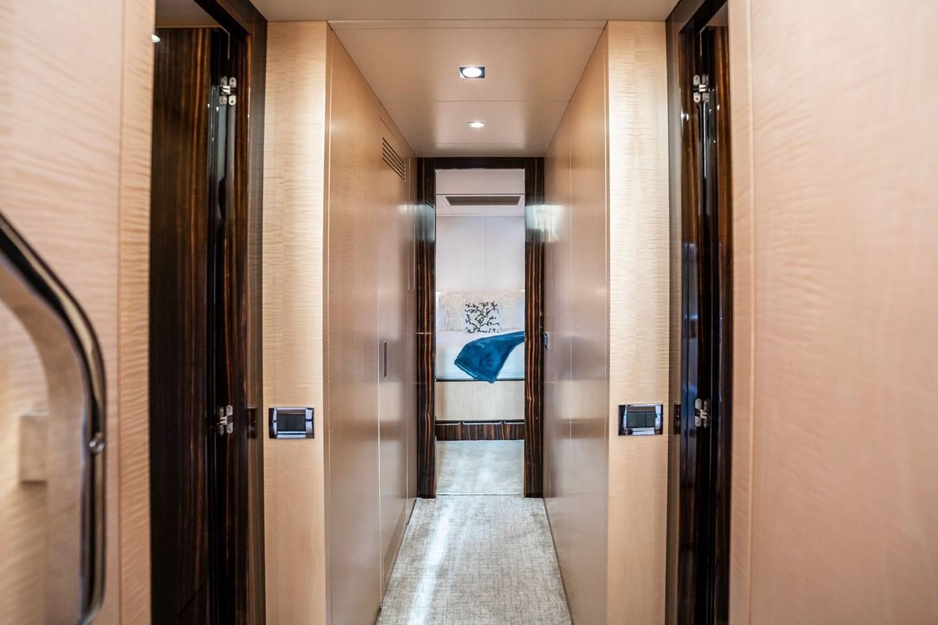 a hallway with doors aboard Valere Yacht for Sale