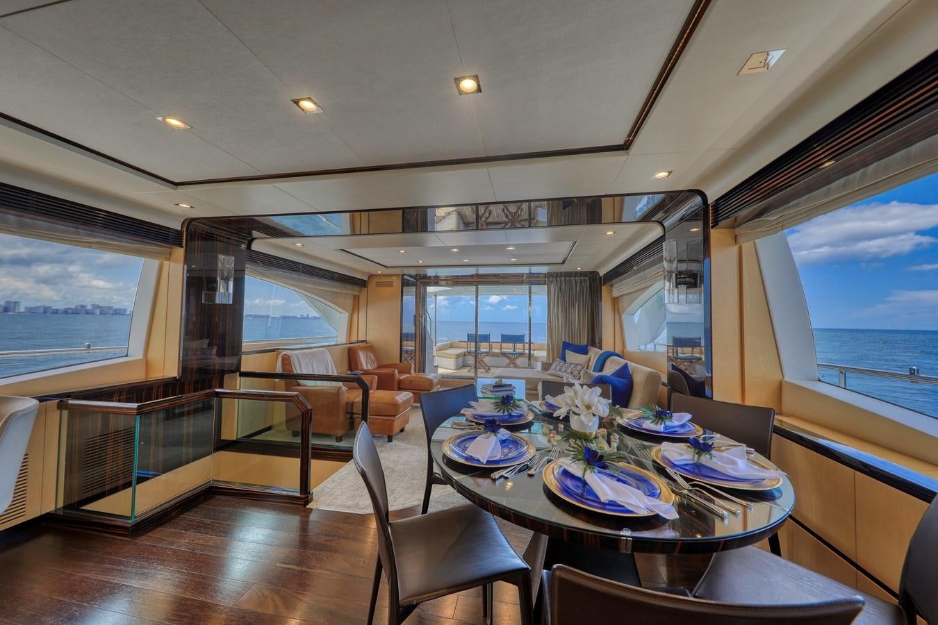 a dining room with a table and chairs aboard Valere Yacht for Sale