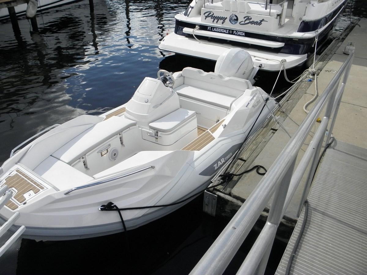 a white boat on the water aboard Valere Yacht for Sale