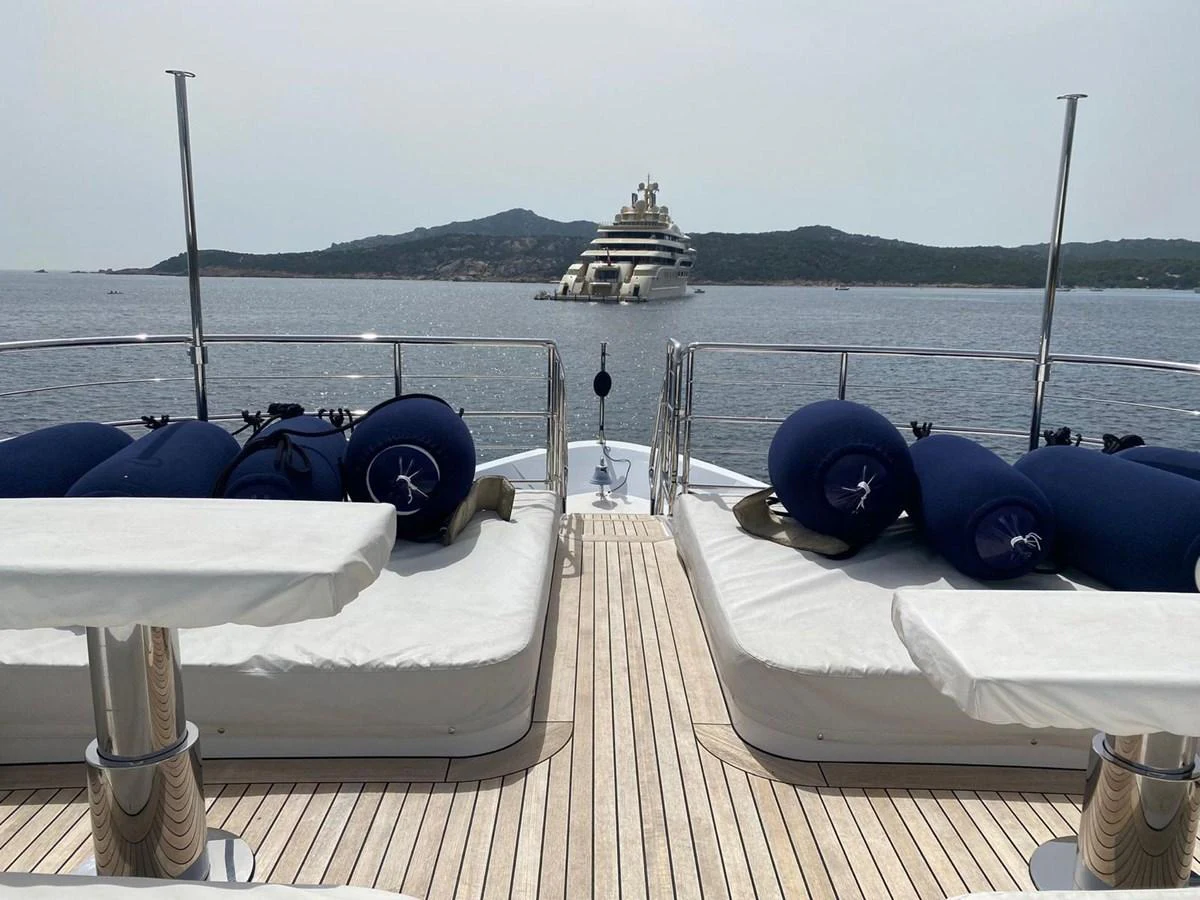a boat on a dock aboard CLASSIC 121 Yacht for Sale