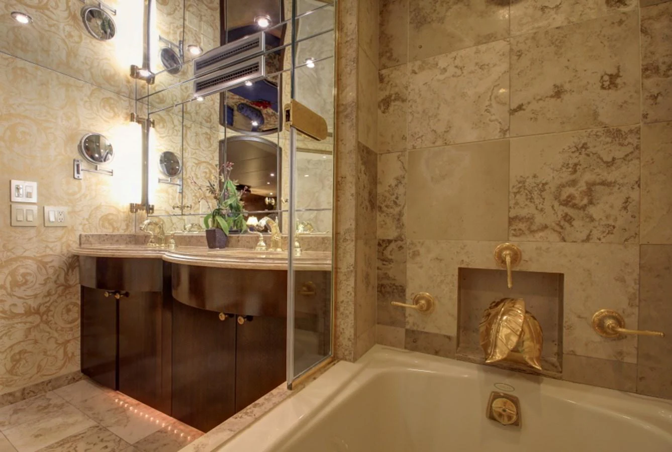 a bathroom with a glass shower aboard SUNDAY MONEY Yacht for Sale