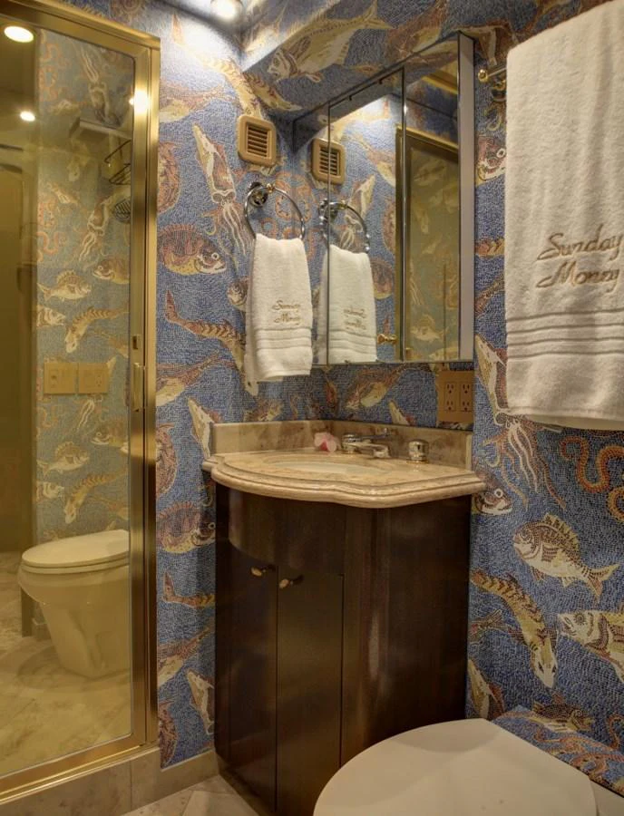a bathroom with a sink and toilet aboard SUNDAY MONEY Yacht for Sale