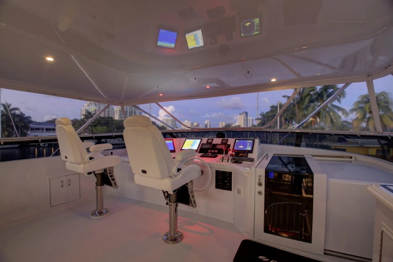 a white airplane with a large window aboard SUNDAY MONEY Yacht for Sale