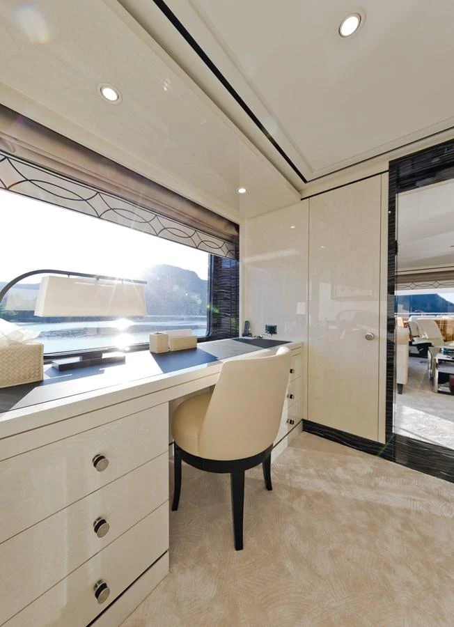 a kitchen with a large window aboard LILI Yacht for Charter